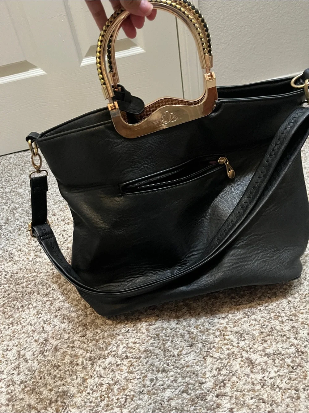 Black bag with gold accents